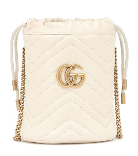 old gucci white drawstring bag|Gucci marmont mini bucket bag.